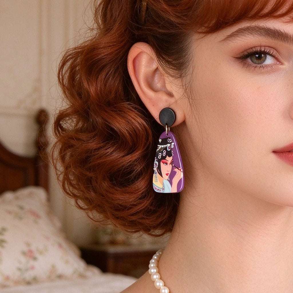 Purple opera figure dangle earrings with black round studs and portrait drops