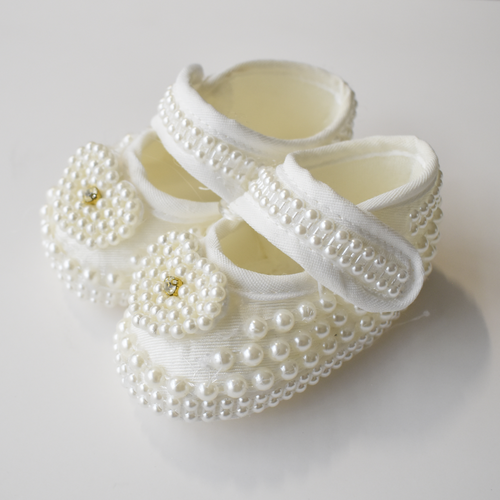 Offwhite beaded baby shoes with pearl straps and tulle dress layer with flower