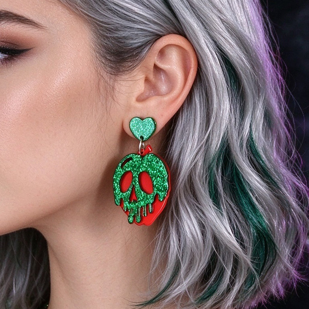 Green glitter skull dangle earrings with red details and heart charm, hook style