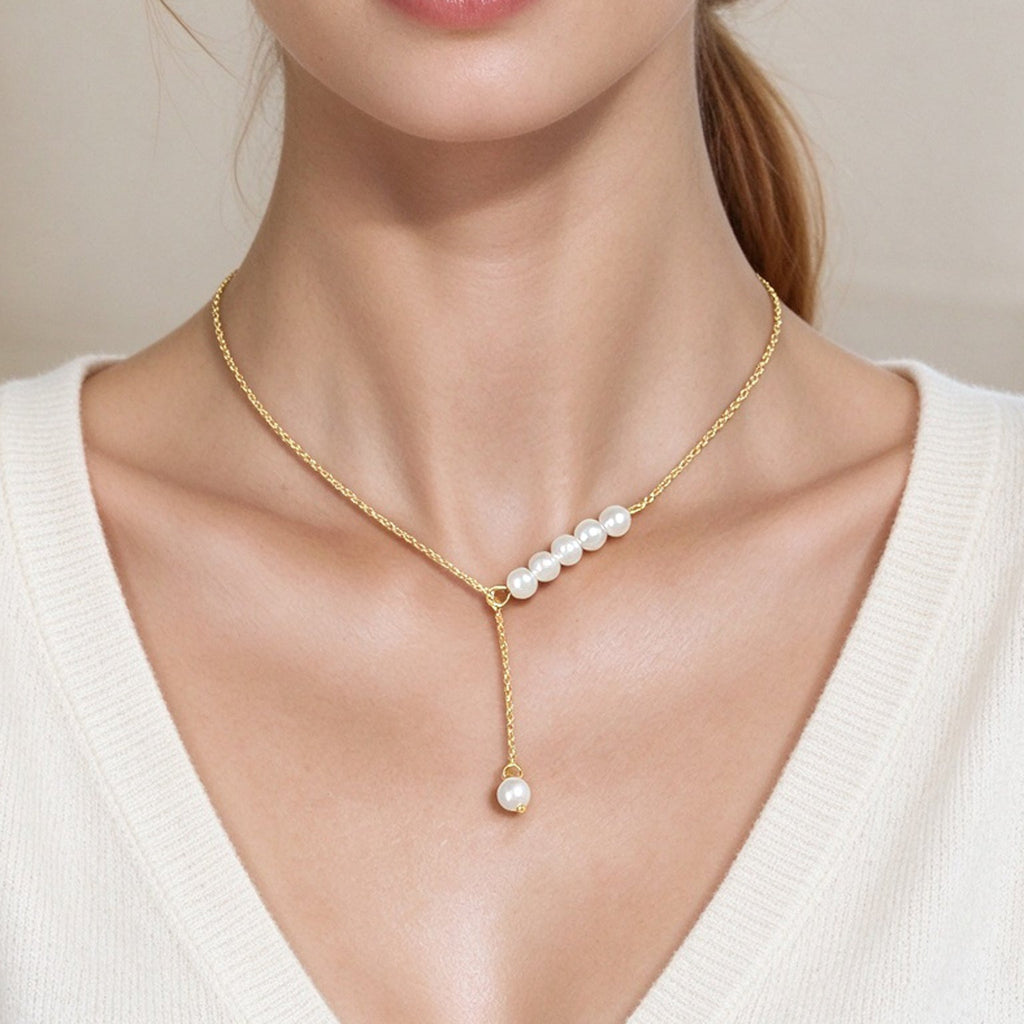 Gold Y-shaped adjustable necklace with pearl cluster and drop pearl