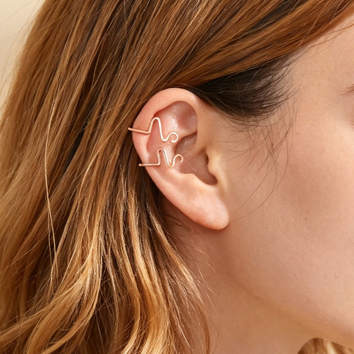 Rose gold wave ear cuff set of two on ear, no-piercing cartilage clips