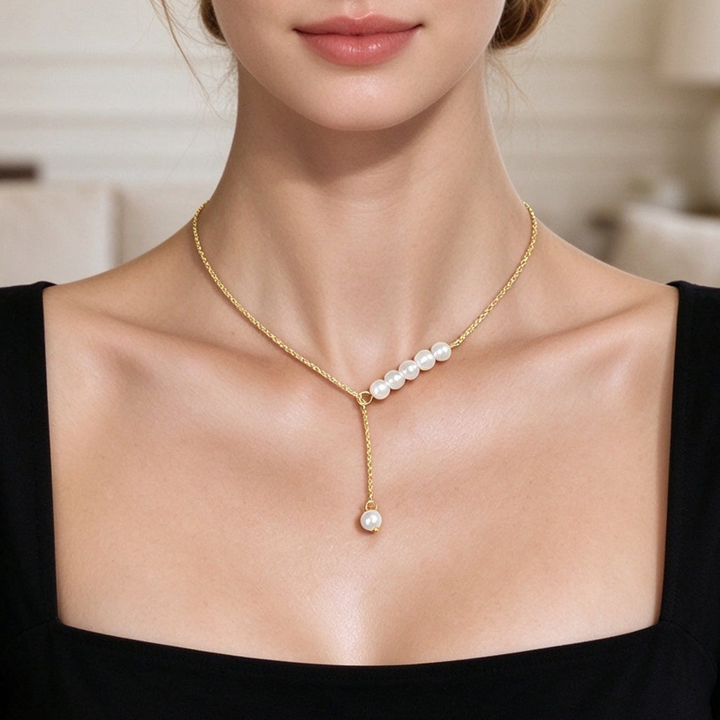 Gold Y-shaped adjustable necklace with pearl cluster and pearl drop pendant