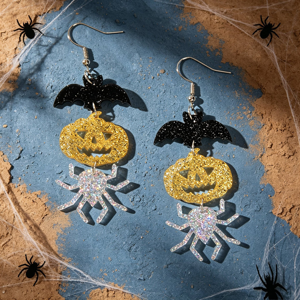 Halloween drop earrings set: black bat, gold glitter pumpkin, and silver spider charms