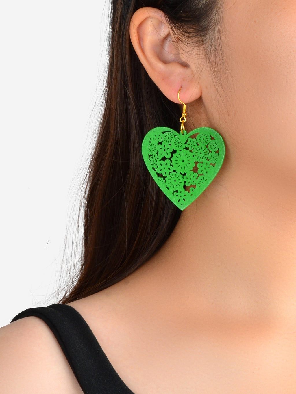Green heart dangle earrings with hollow floral cutout and gold hooks