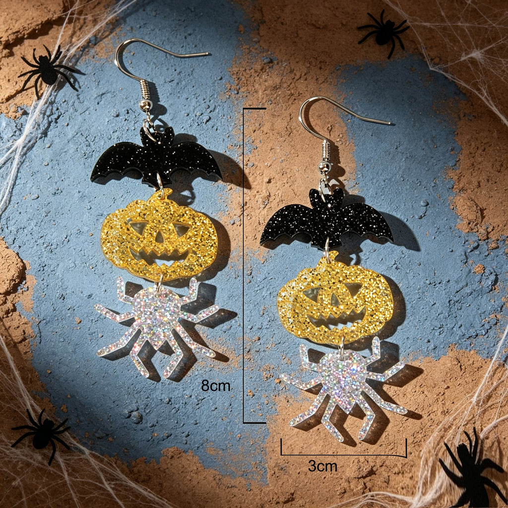 Halloween drop earrings with black bat, gold pumpkin, silver spider; approx 8 cm long