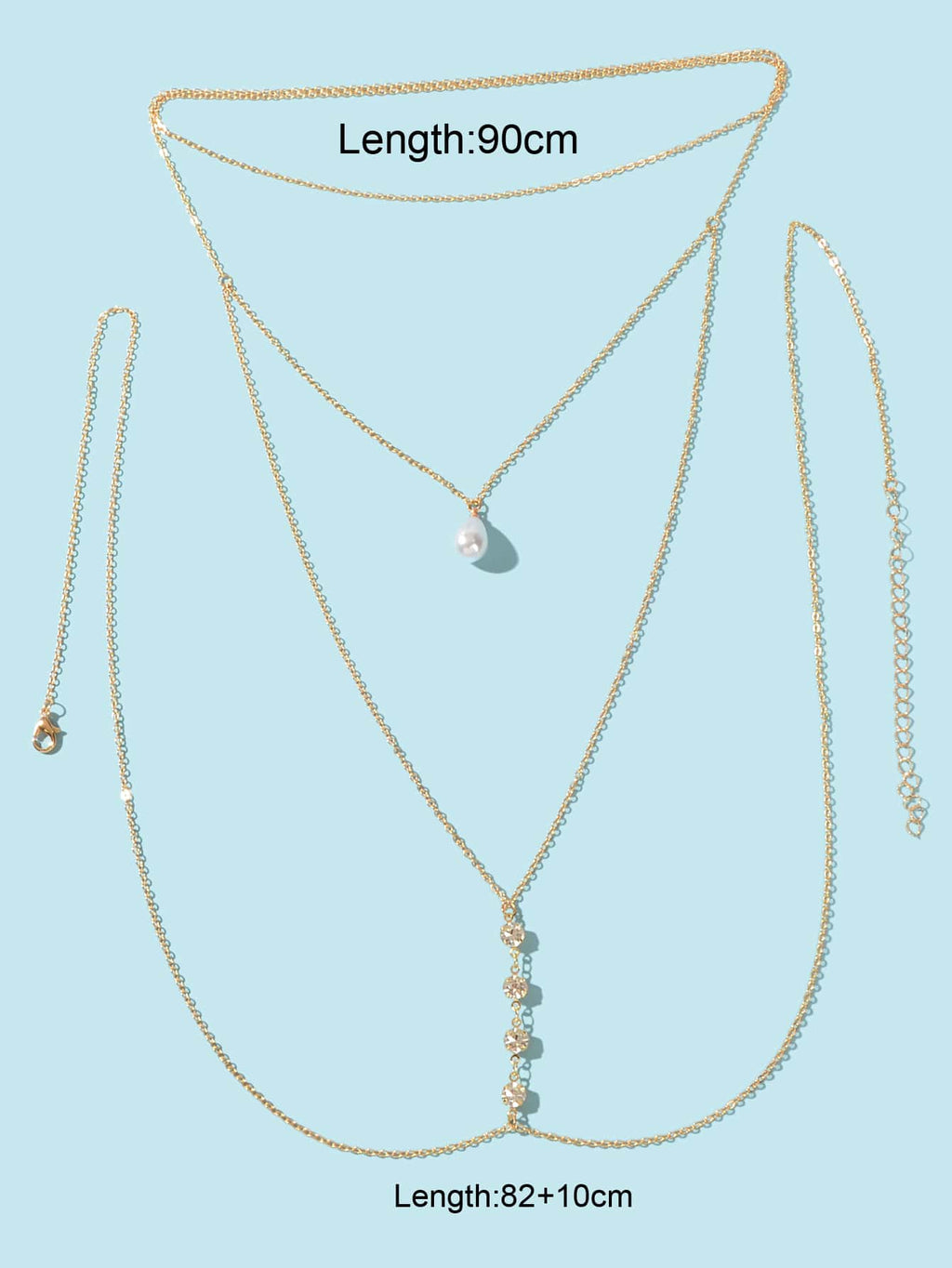 Gold multi-layer pearl body chain with three teardrop pendants and bead strands