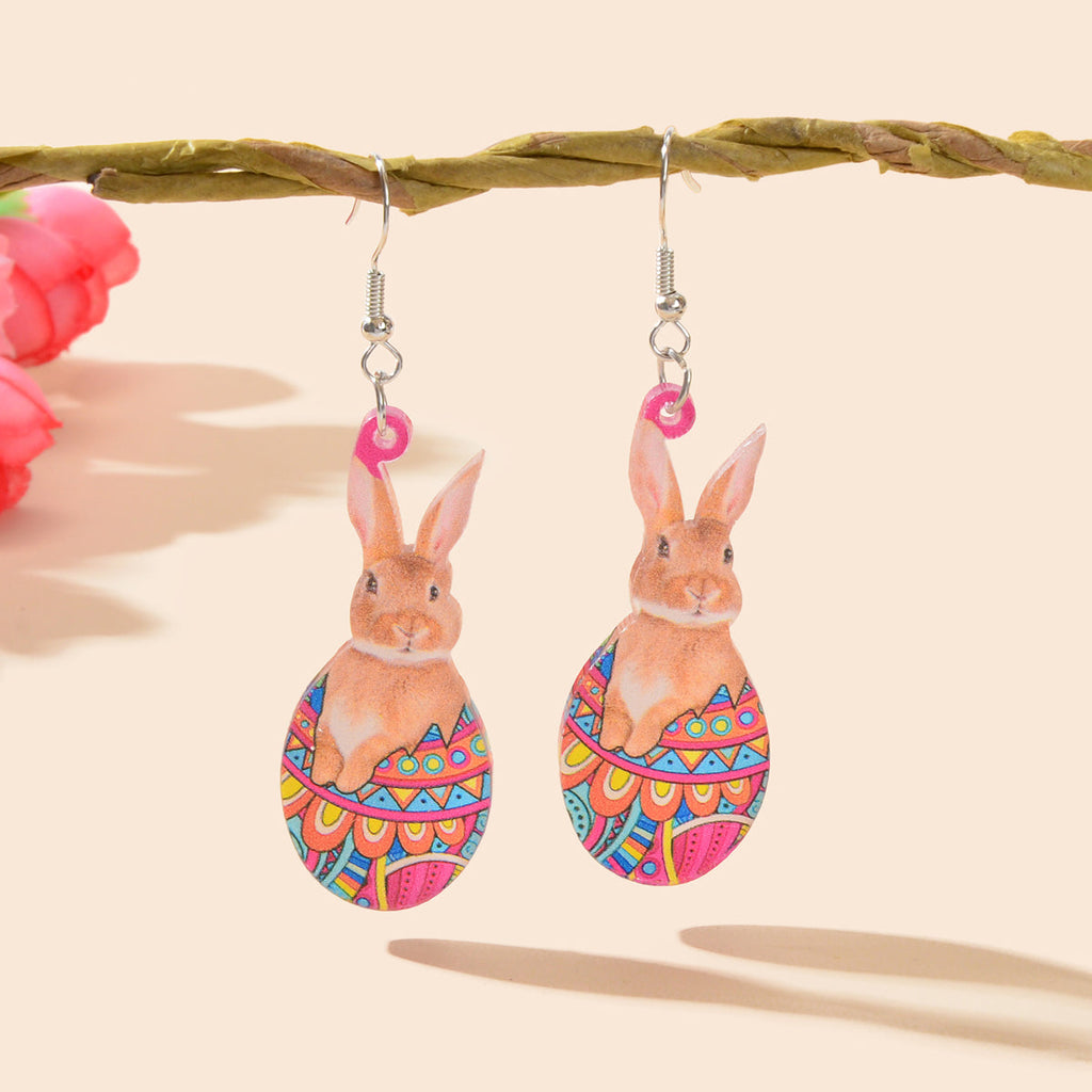 Dangling bunny charm earrings with colorful Easter egg pattern and pink ear tops