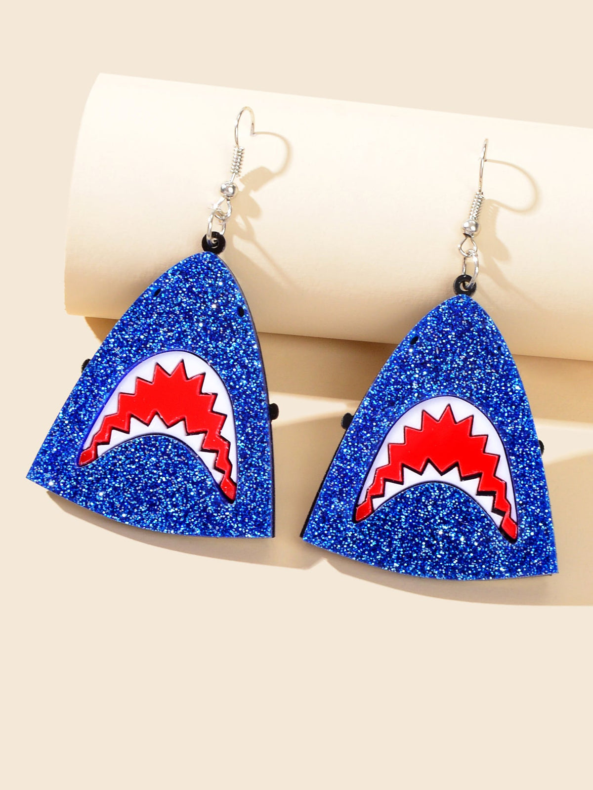 Blue glitter triangular shark-face acrylic drop earrings with red and white detailing