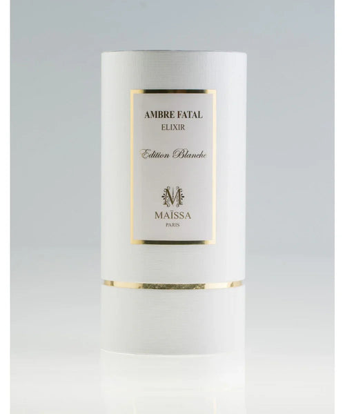 Perfume bottle with white cylinder cap, gold trim, and cream label reading Ambre Fatal Elixir
