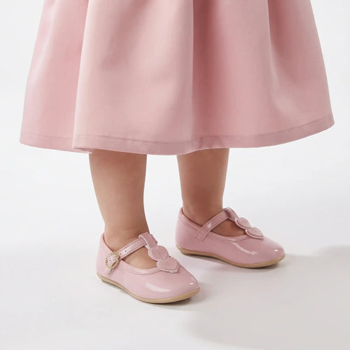 Blush baby Mary Jane formal shoes with heart appliques and adjustable strap