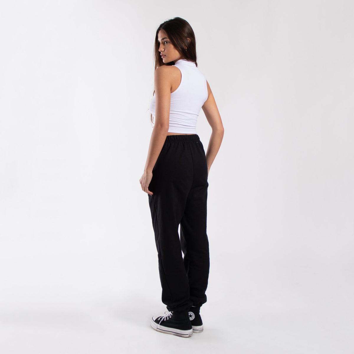 White sleeveless mock-neck cropped muscle tank, side view, fitted stretch knit