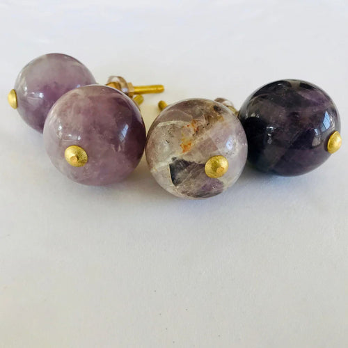 Amethyst sphere cabinet knobs with gold posts and round purple stone faces