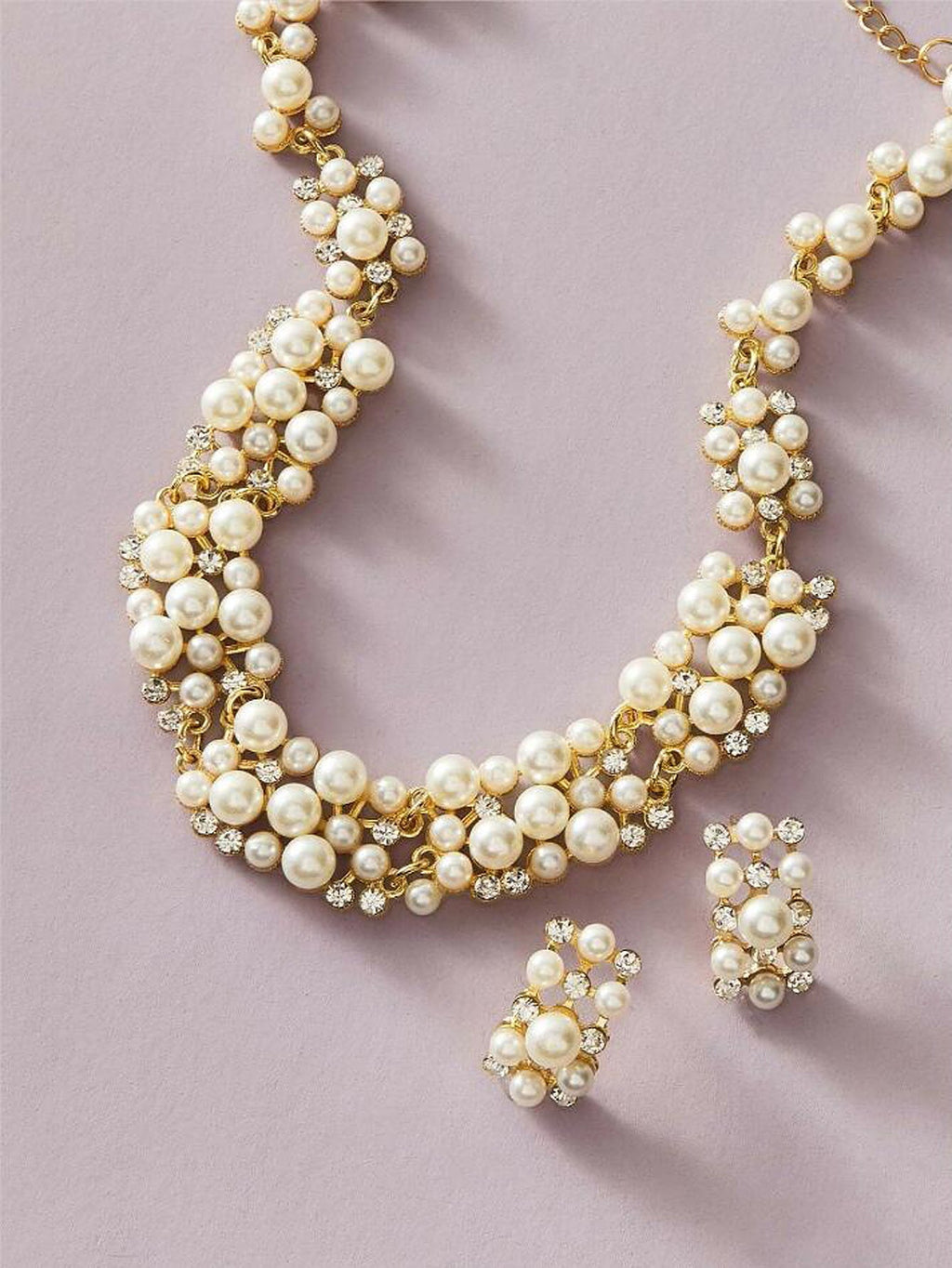 White pearl rhinestone collar necklace set with drop stud earrings and gold-tone detail