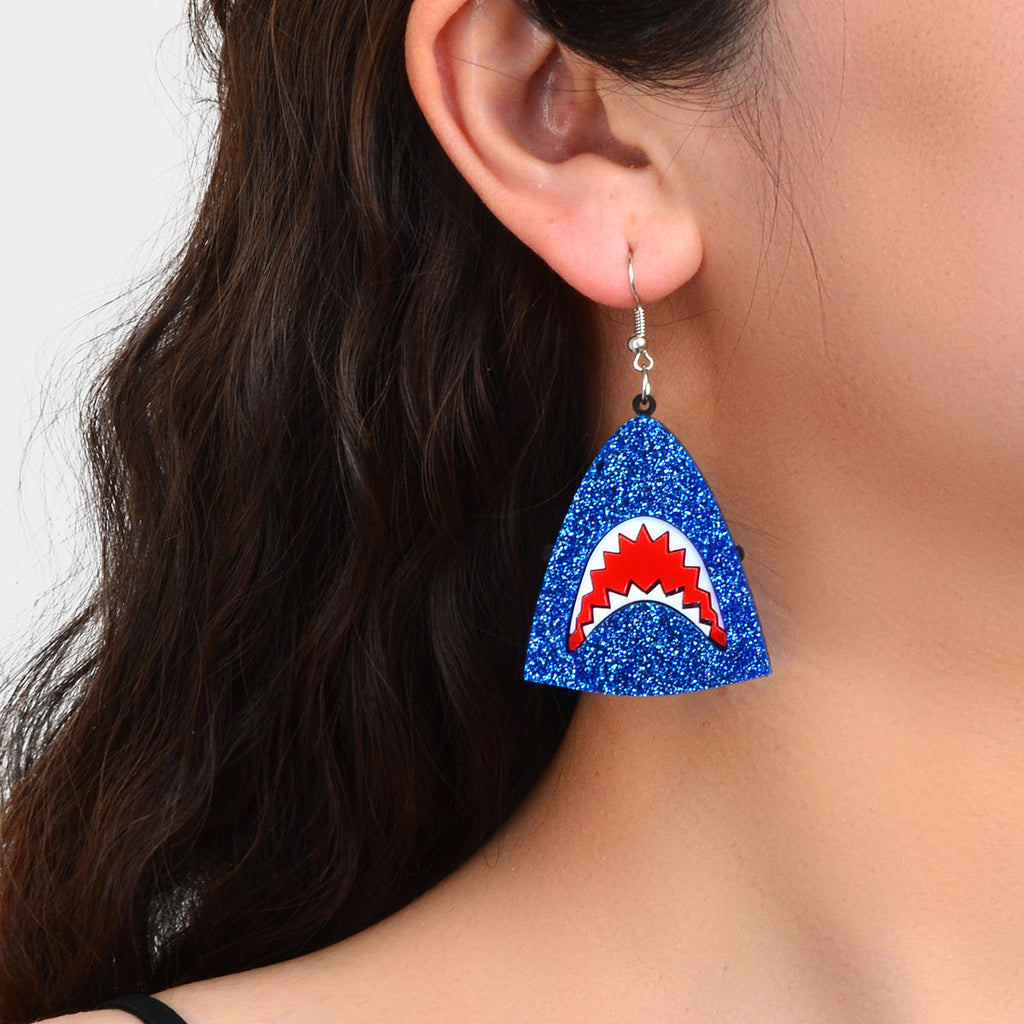 Blue glitter triangular shark-face dangle earrings with red and white center
