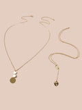 Gold-tone chain necklace set with heart and round disc pendants