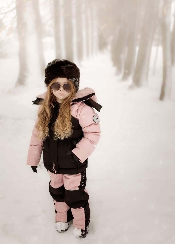 Blush and black kids snowsuit jacket and snowpants with furry hood and ski goggles
