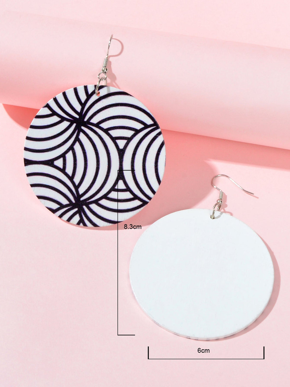 Round zebra swirl earrings with silver hooks; size shown as 8.3 cm and 6 cm
