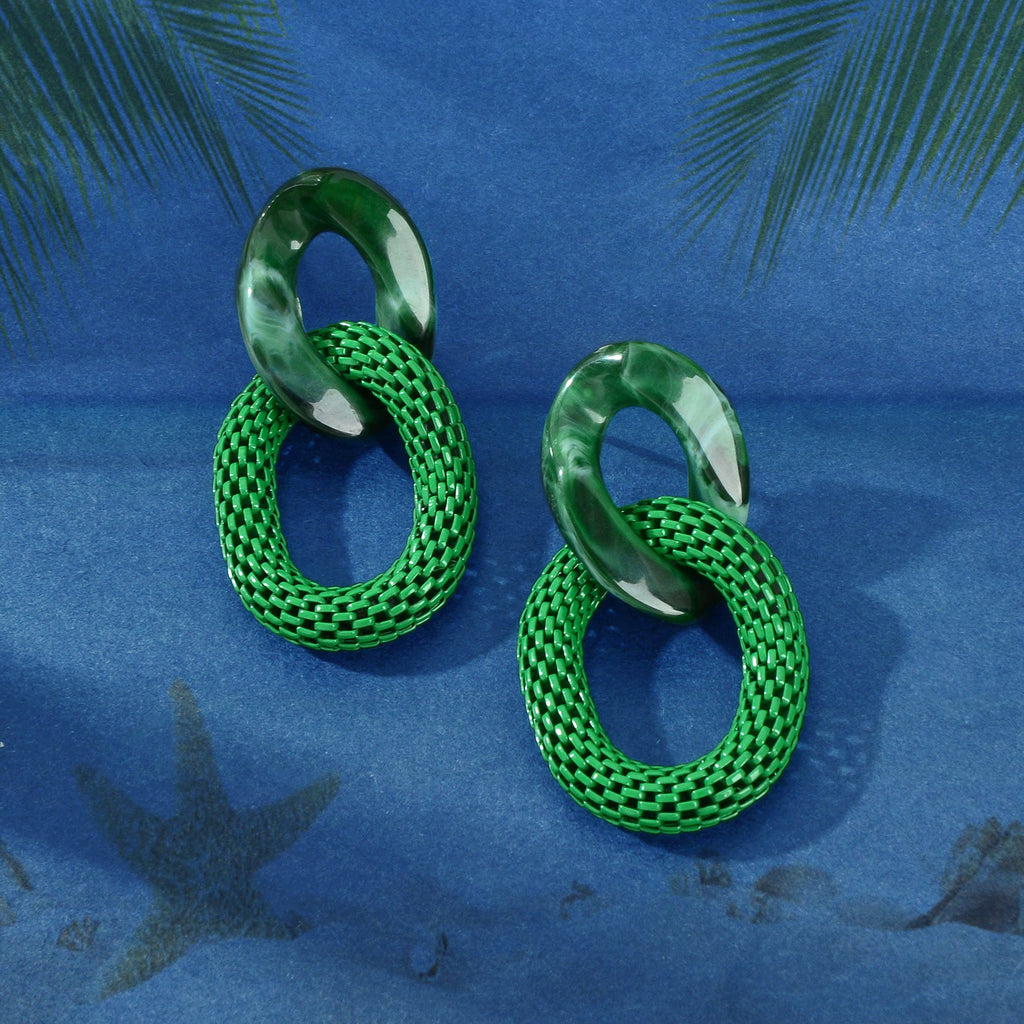 Green resin hoop and textured chain-link drop earrings, angled view of oval rings