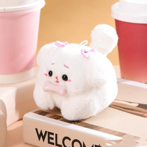 White bunny plush drawstring doll with pink snout, big ears, and stitched facial details