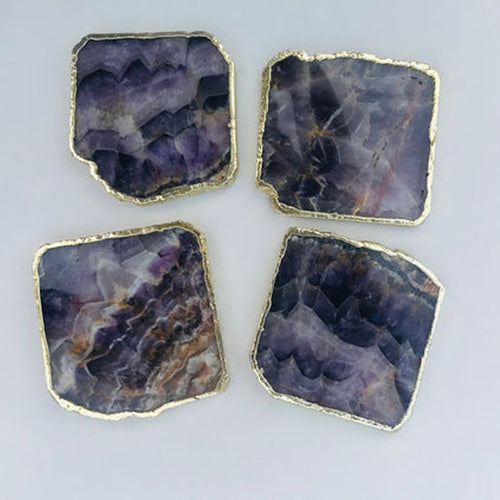 Set of 4 amethyst slice coasters, gold-toned edges, purple and smoky veining