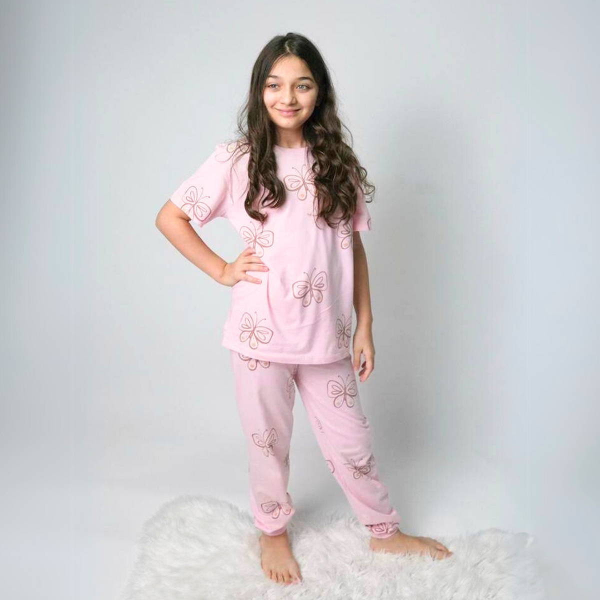 Girls' pink pajama set with butterfly print T-shirt and cuffed pants