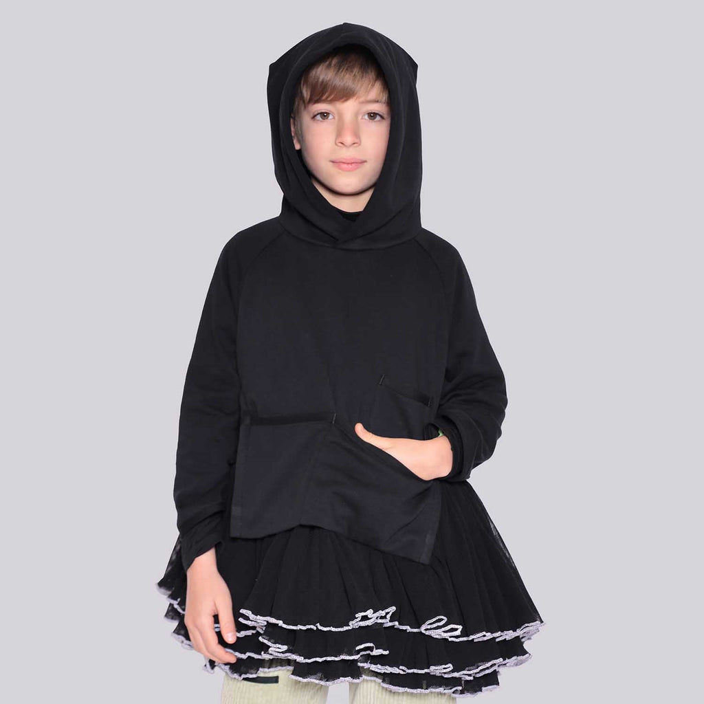 Black hooded tunic with tie sleeve cuffs and tiered tulle skirt with chain trim