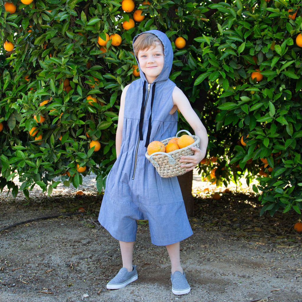 Blue denim hooded sleeveless jumpsuit with drawstring hood and wide pant legs