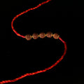 Rudraksha Golden Rakhi
