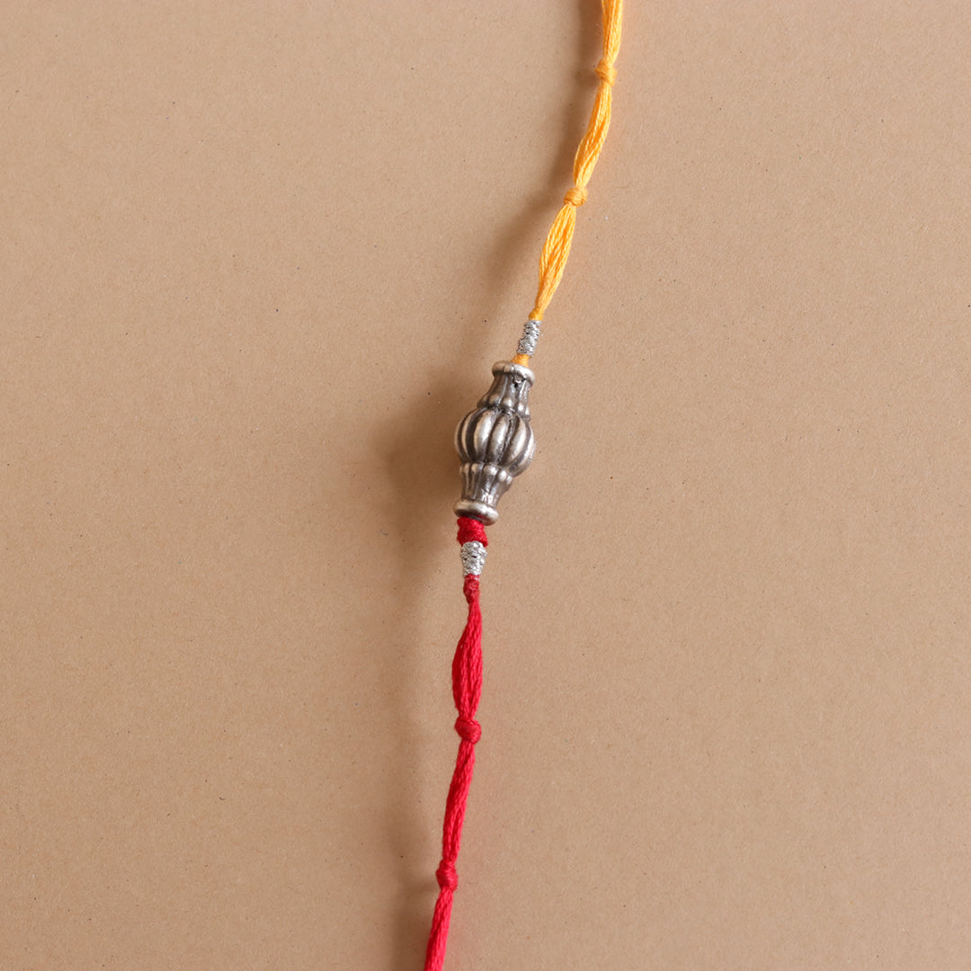 Sliver Ovol Beads Rakhi