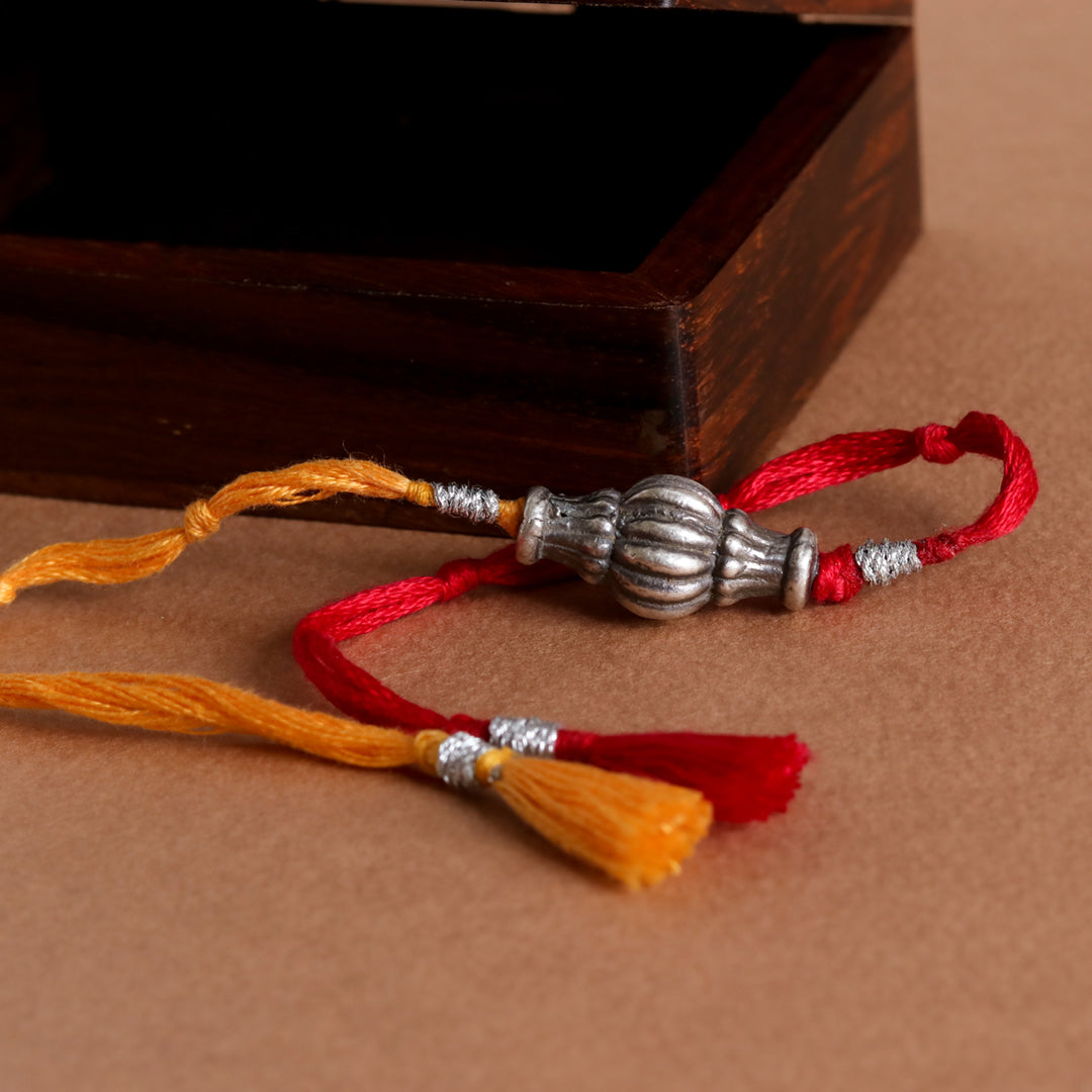 Sliver Ovol Beads Rakhi