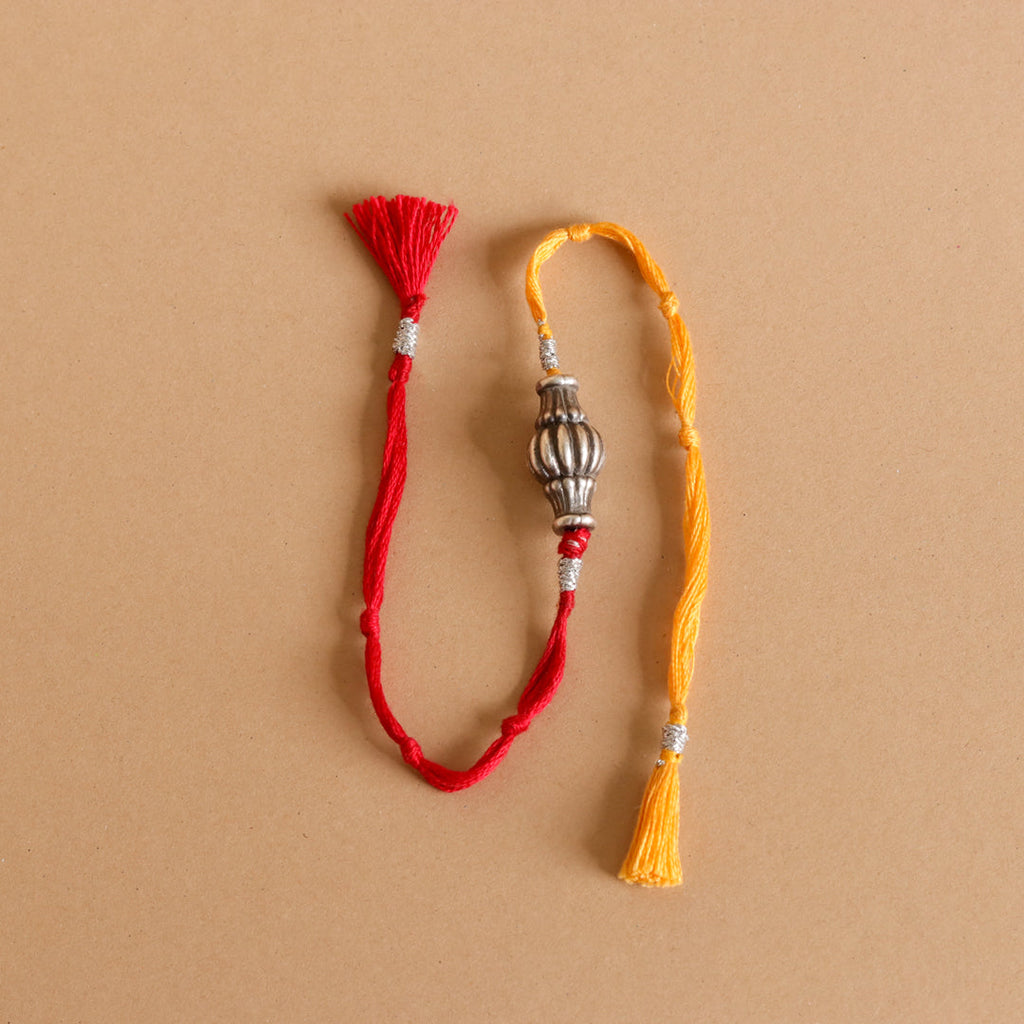 Sliver Ovol Beads Rakhi