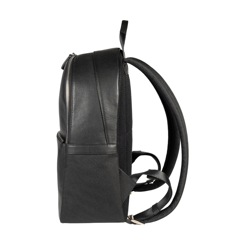 RB2001A | Netbook/Tablet Carrier Backpack in Nylon/Vera Leather, with light grain. Zipper closure and adjustable shoulder straps - Black color - Dimensions: 27 x 38 x 14 cm. Packaging: Non-Woven Fabric Bag - Bag at Dealshubindia