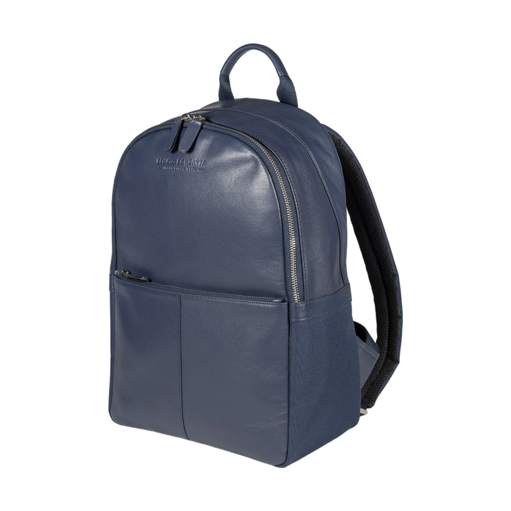 RB2001D | Netbook/Tablet Carrier Backpack in Nylon/Vera Leather, with light grain. Zipper closure and adjustable shoulder straps - Blue color - Dimensions: 27 x 38 x 14 cm. Packaging: Non-Woven Fabric Bag - Bag at Dealshubindia