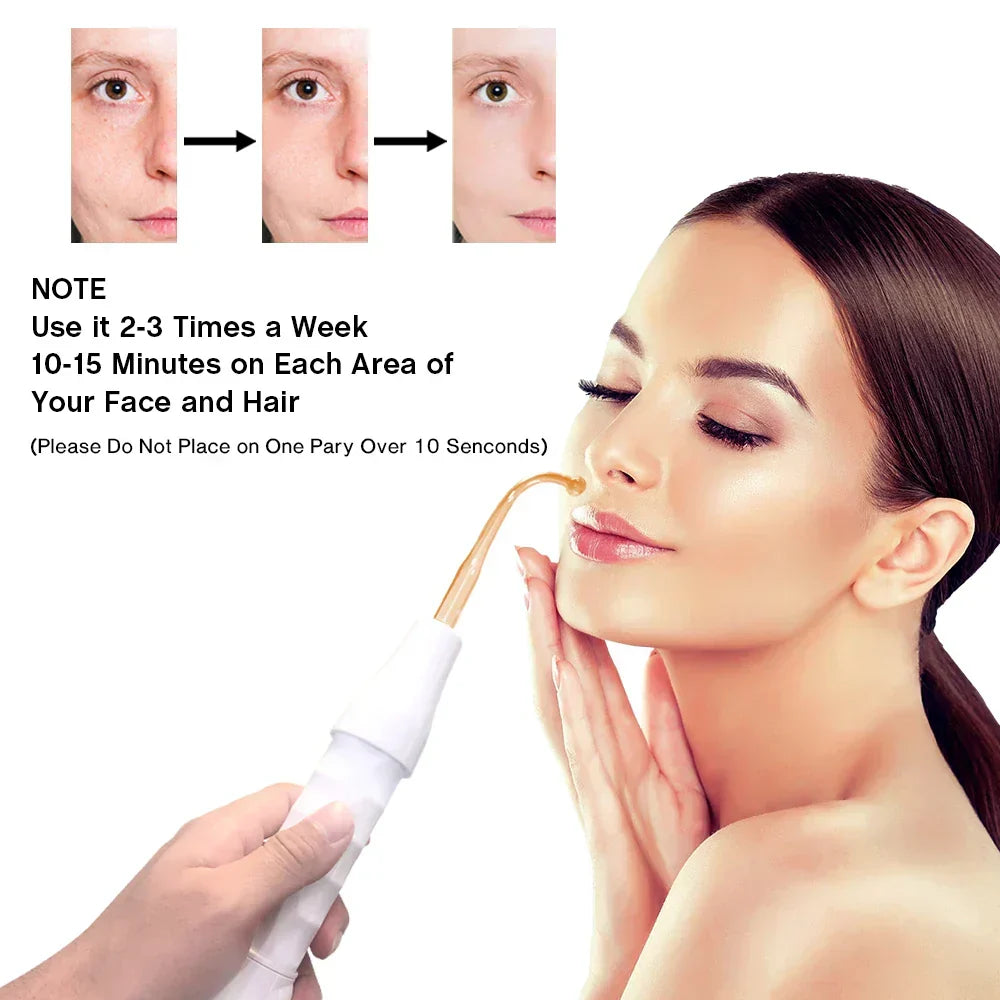 High-frequency beauty wand being used on face with white handheld applicator