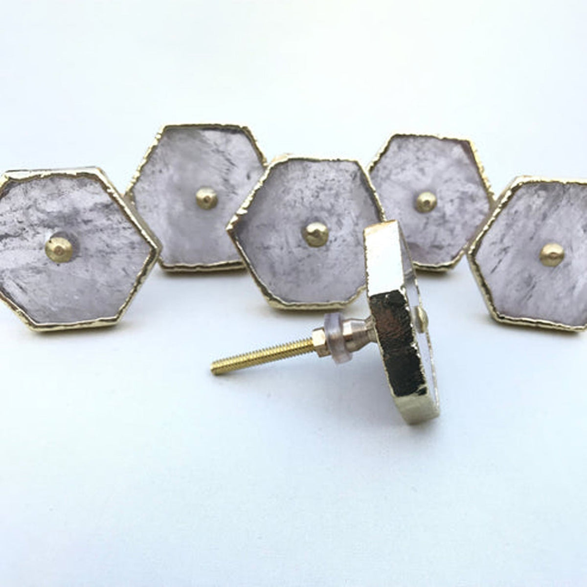 Hexagon cabinet drawer pull set with silver face and gold-tone rim, screw and mounting hardware