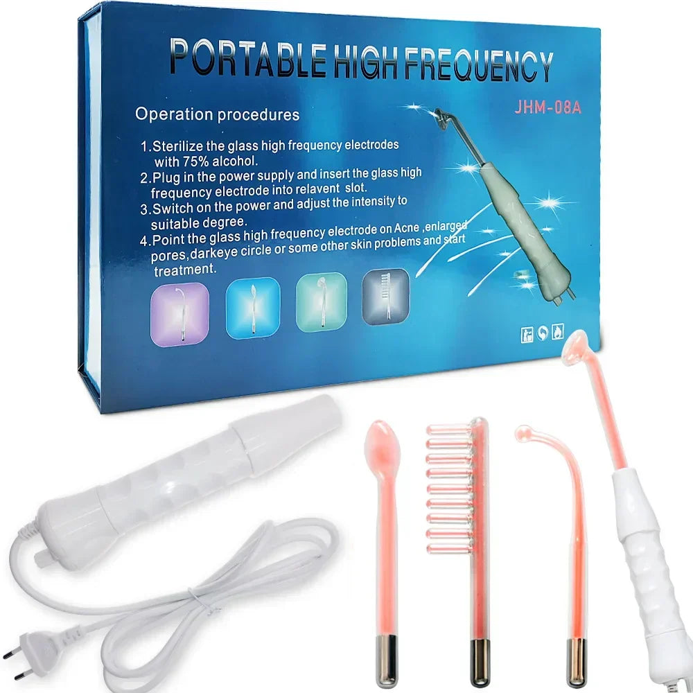 Portable high-frequency beauty set with white wand and four colored electrode tips