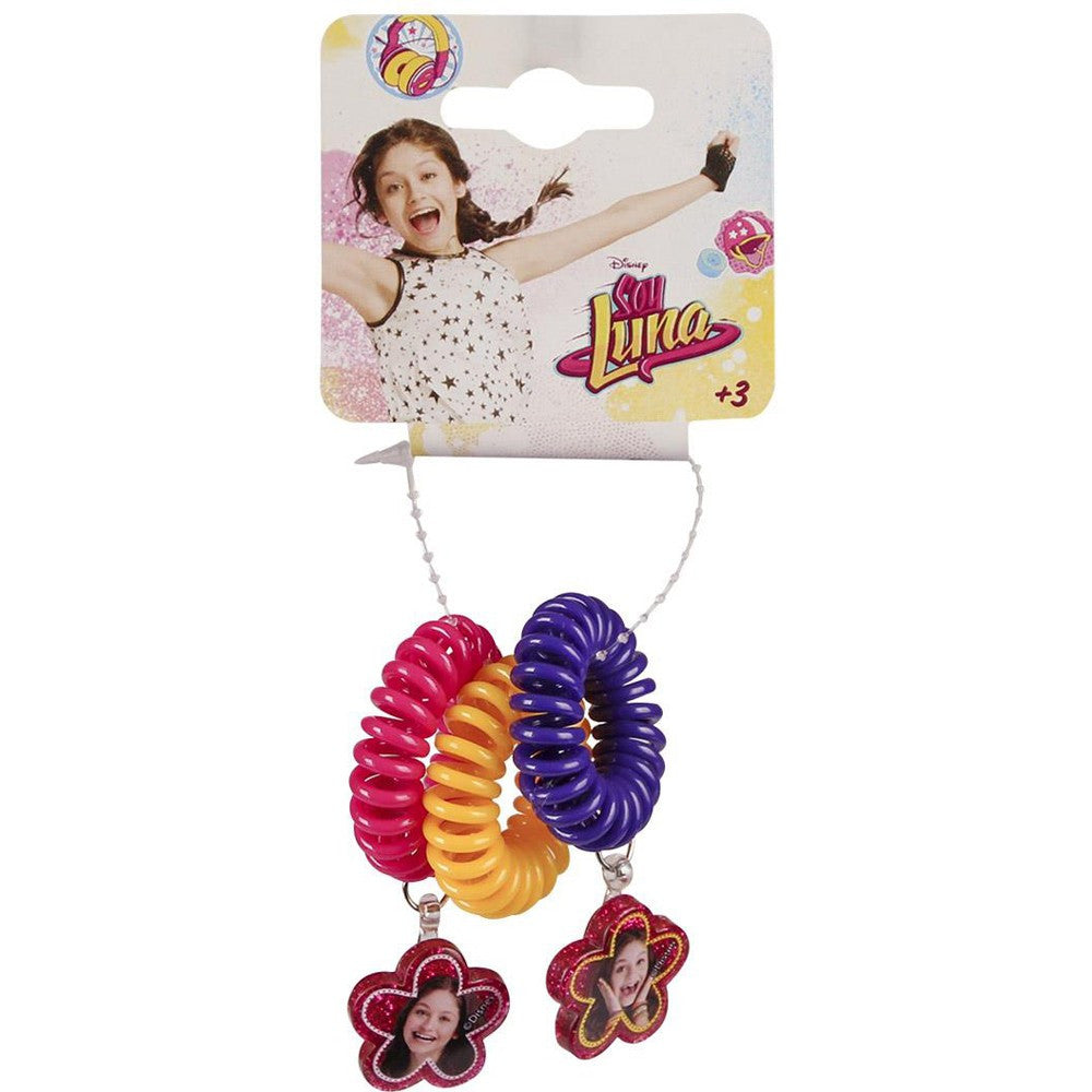 Colorful spiral hair tie set with pink, yellow, and purple ties and flower charms