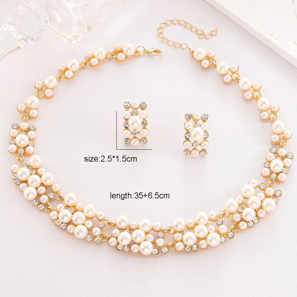 Pearl rhinestone necklace and stud earring set with white pearls and gold accents